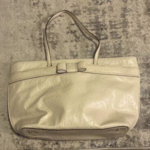 Tan Kate Spade tote. Large size and brand new- never worn. Tags attached.